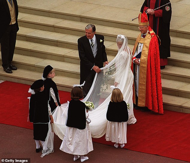 The bride arrived with her father, Christopher Rhys-Jones, at St George's Chapel, Windsor