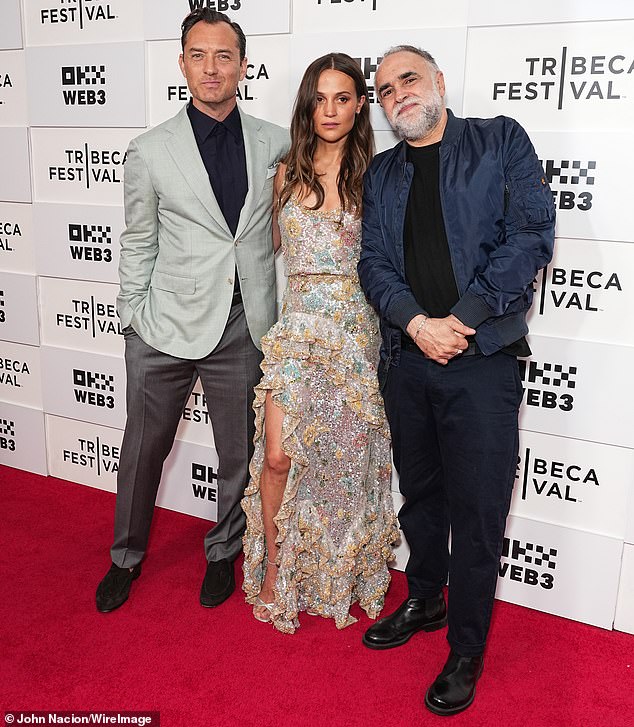 The Louis Vuitton show came just days after Alicia reunited with Firebrand co-star Jude Law (left) and director Karim Aïnouz (right) at the film's premiere at the Tribeca Film Festival on June 11.