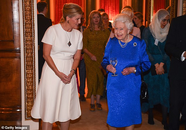 It is said that the Queen's first words when she met Sophie, the daughter of a Kent tire salesman, years ago were: 'You wouldn't pick her out of a crowd.'  Above: The couple together at a reception at Buckingham Palace in 2019