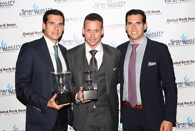 Oren and Alon, both 36, (pictured with Tal, centre) have since been accused of rape by 30 more women after being hit with an initial lawsuit filed by two alleged victims this month.