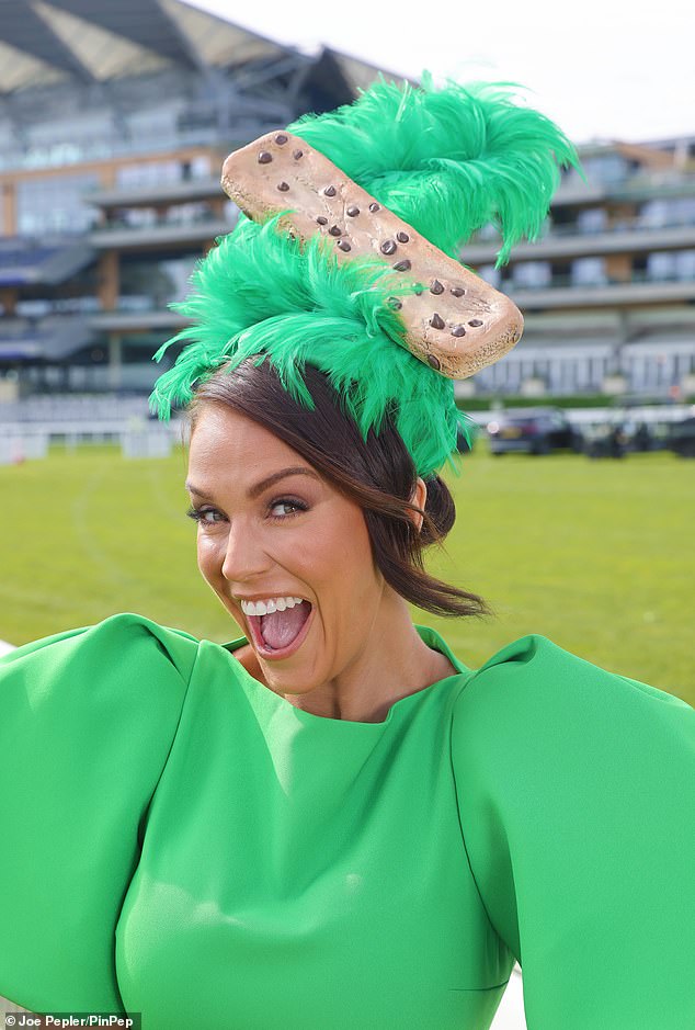 The TV personality complemented her stylish green ensemble with a crazy green fascinator with a giant cookie on top.  No new hats or fascinators are permitted in the Royal Enclosure