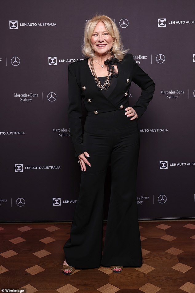 Meanwhile, TV icon Kerri-Anne, 70, looked effortlessly chic in a figure-hugging black Balmain jumpsuit