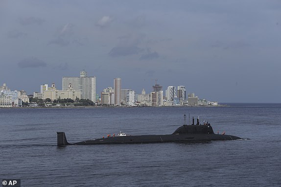 The nuclear-powered Russian submarine Kazan leaves the port of Havana, Cuba, Monday, June 17, 2024. A fleet of Russian warships arrived in Cuban waters last week ahead of planned military exercises in the Caribbean.  (AP Photo/Ariel Ley)