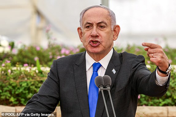 TOPSHOT - Israeli Prime Minister Benjamin Netanyahu speaks during a state memorial ceremony for the victims of the 1948 Altalena affair, at the Nachalat Yitzhak Cemetery in Tel Aviv on June 18, 2024. (Photo by Shaul GOLAN / POOL / AFP) (Photo by SHAUL GOLAN /POOL/AFP via Getty Images)