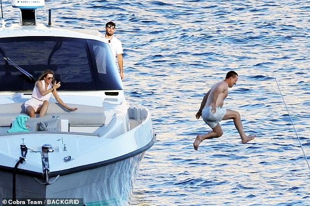 The former Chelsea and England captain relaxed with his wife aboard a rented yacht during their current sun holiday on the island of Capri in south-west Italy