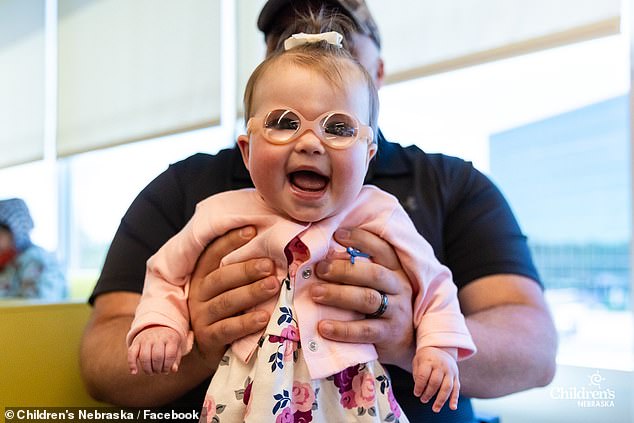 Madison was finally able to get glasses, an opportunity that changed the baby's life and that of her father and mother, Andrew (pictured)