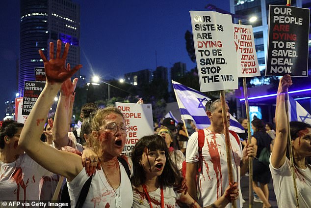 Relatives and supporters of Israelis taken hostage by Palestinian militants in Gaza during the October 7 attacks demonstrate in the central city of Tel Aviv on June 8, 2024, calling for their release.