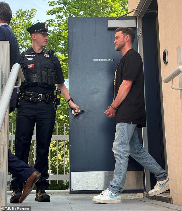 On Tuesday, news broke that Justin (seen leaving the police station), 43, had been taken into custody for drunken driving in the exclusive Hamptons enclave of Sag Harbor