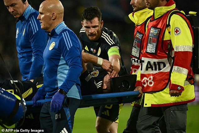 Kieran Tierney was left distraught when he was stretchered off with an injury in the second half