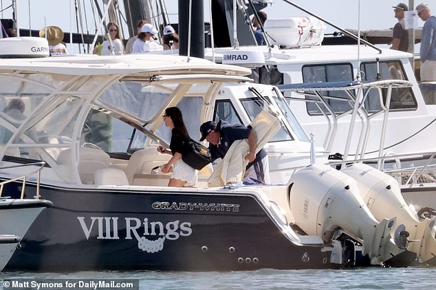 The pair boarded Belichick's powerboat, VIII Rings, aptly named after his eight Super Bowls