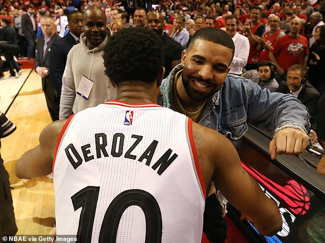 Drake and DeRozan embrace after the Raptors beat the Pacers in Game 7 of the 2016 first round