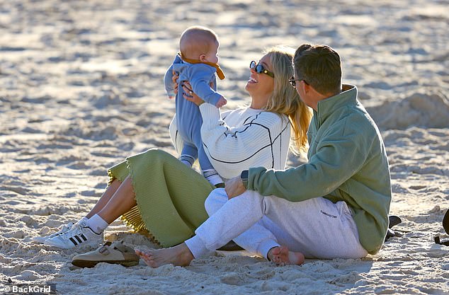 Holly and Jimmy were also seen taking the child to the beach, with the lovebirds getting a glimpse of what their happy family will be like.