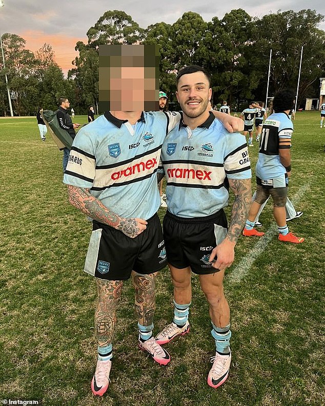 Taylor-Myles (pictured right with a teammate) has been told he can't play football unless he covers up the shocking words