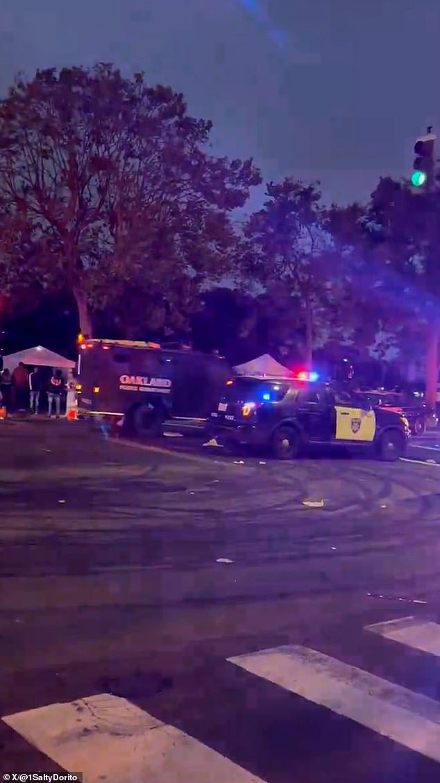 The violent incident occurred after a largely peaceful Juneteenth celebration that drew about 5,000 people at the lake earlier in the evening.  In the photo: Multiple police units responded to the shooting