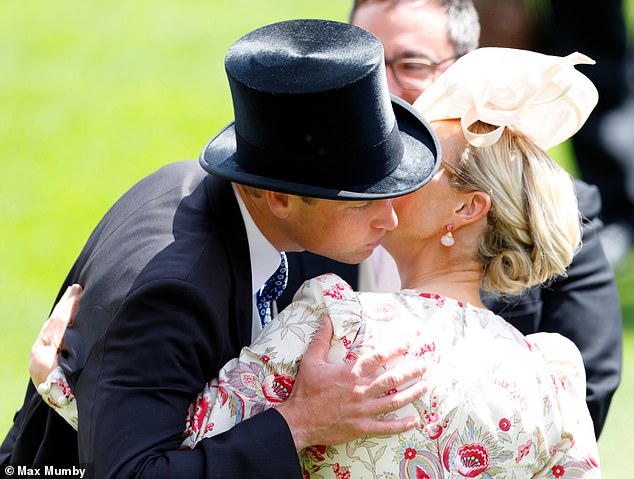 The Prince of Wales, 41, was spotted warmly hugging Princess Anne's daughter, 43, during the second day of the races in Berkshire