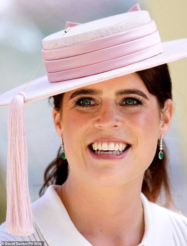 Eugenie wore summer make-up and combined peach blush with full lashes and glossy lips