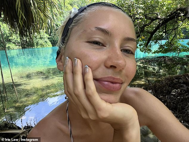 While many WAGs boarded private planes at Manchester airport ahead of the match on Thursday, Iris instead uploaded a slew of tropical snaps from a sun-drenched location