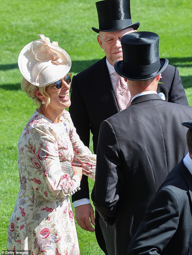 Cozy Zara was also caught chatting with Prince William and his mother-in-law Carole yesterday