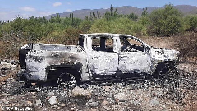 A burnt-out car believed to belong to the trio was found by local police