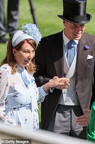 Carole holds William's hand