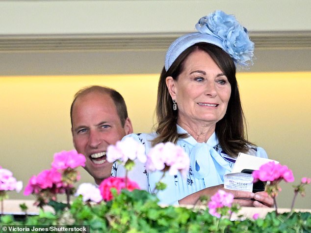 Carole seen at Royal Ascot yesterday, with Prince William smiling behind her