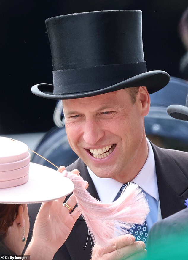 The Prince of Wales grinned playfully at Eugenie as she tried to hold on to her thick pink tassel
