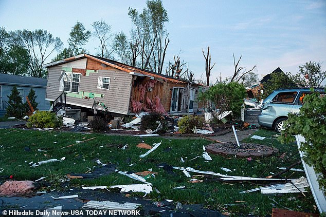 NOAA reported that this month of May was the second most active month for severe weather in two decades, as 23 states stretching from South Dakota to Florida experienced at least one tornado in that time.  Pictured: Damage caused by a tornado that ripped through Portage, Michigan in May