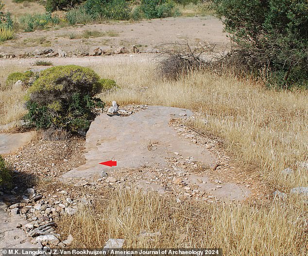 Above, the spot where Langdon and his co-author found the ancient graffiti of Mikon (red arrow).  the shepherd's inscription – made on the exposed marble of Vari's Barako Hill near Athens – has now suffered two millennia of erosion