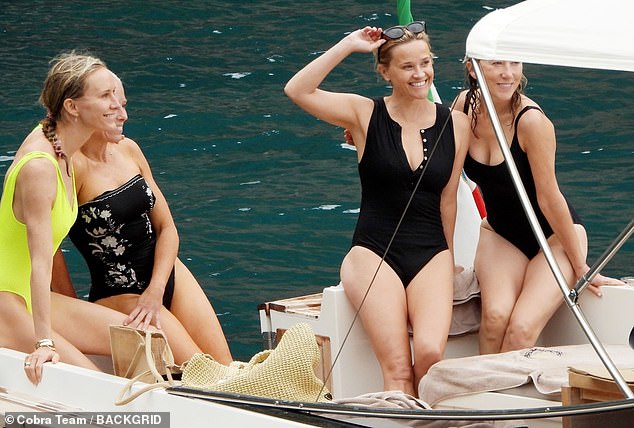 The Sweet Home Alabama star posed in the swimsuit while on a boat with friends off the coast of Portofino