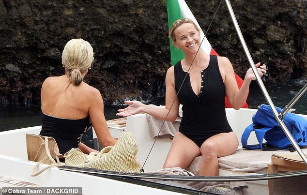 Reese looked fantastic in her one-piece swimsuit on Thursday