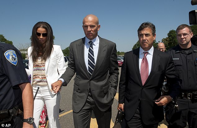 Here, Burke (second from right) is pictured escorting his client, NBA all-star and then-Brooklyn Nets head coach Jason Kidd, out of court following a plea deal he made after Kidd was arrested for driving under the influence, which resulted in a single car crash in Southampton