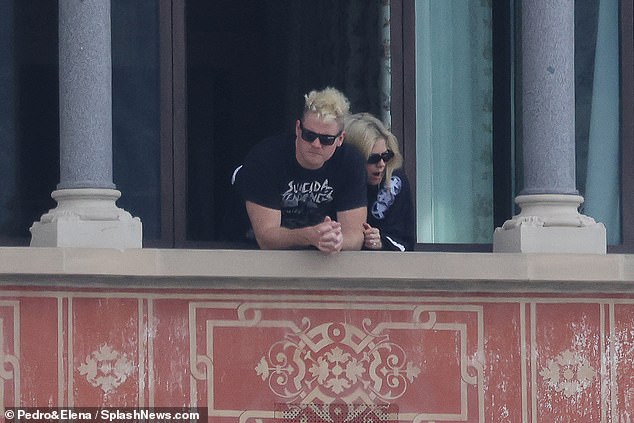 The lovebirds were seen cuddling together as they enjoyed the breathtaking view of Lake Como