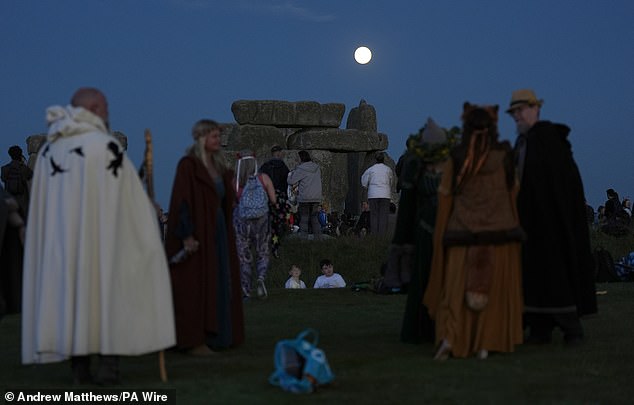 In a tradition dating back thousands of years, Druids and pagans joined a colorful mix of sun worshipers