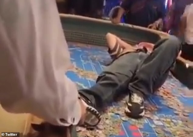 Another video showed Castillo lying on the craps table to avoid being grabbed