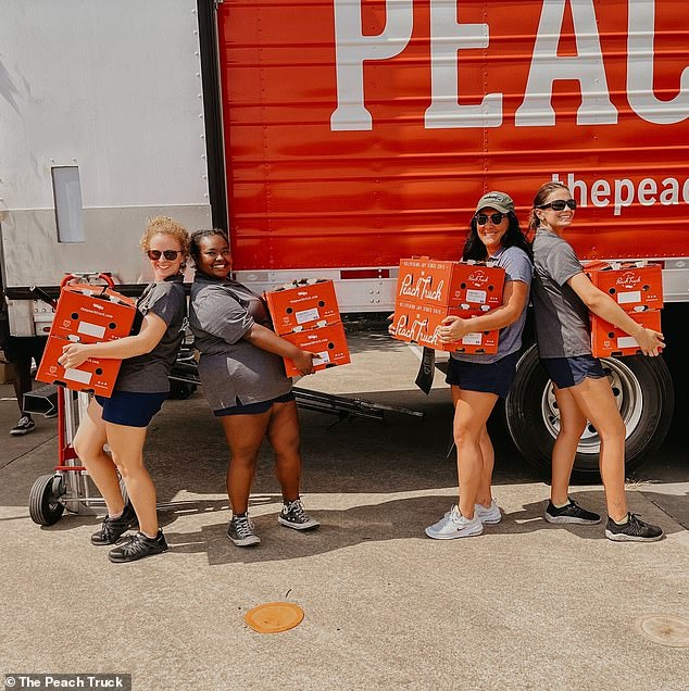 Employees are photographed in front of a company car during the 2022 peach season