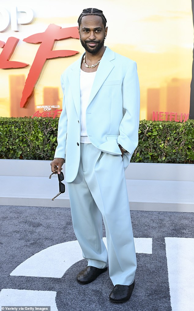 Rapper Big Sean (born Sean Michael Leonard Anderson), 36, joined in on all the fun in a light blue suit, white t-shirt and black shoes