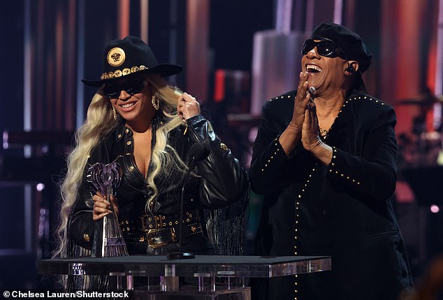 “I'm honored to introduce so many people to the roots of so many genres.  I'm so happy my fans trusted me,” Beyoncé said of Renaissance and Cowboy Carter;  pictured with Stevie Wonder on April 1 in LA