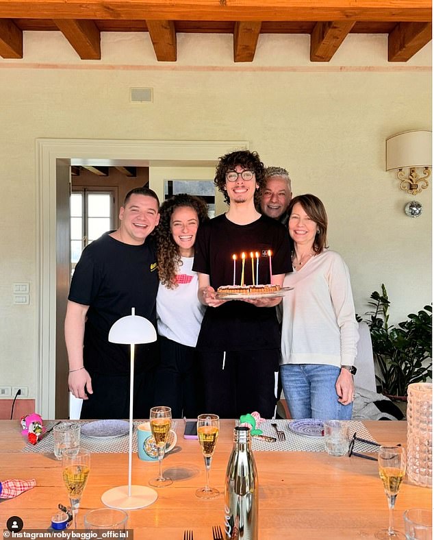 Baggio and his family (photo) were locked in a room by the robbers