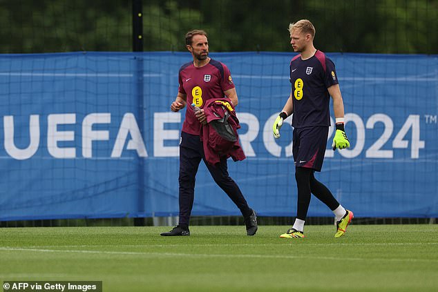 Southgate in conversation with Arsenal goalkeeper Aaron Ramsdale on Friday