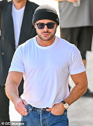 Zac cut an intimidating figure on Thursday with his bulging biceps and broad shoulders, a far cry from his young self