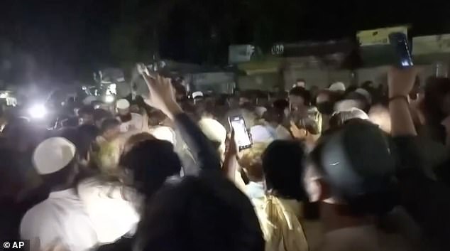 Many in the violent crowd filmed and cheered the horrific lynching of the tourist
