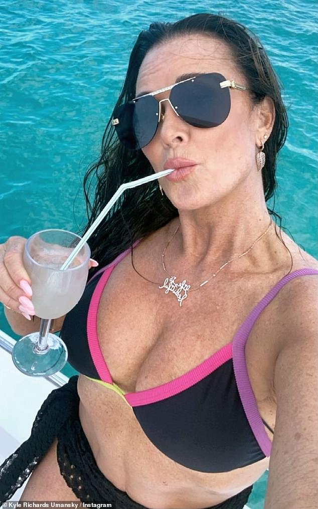 Richards shared a selfie while sipping a cocktail during a 2021 yacht ride