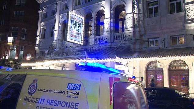 Paramedics arrive at the Noel Coward Theater after Sir Ian's fall