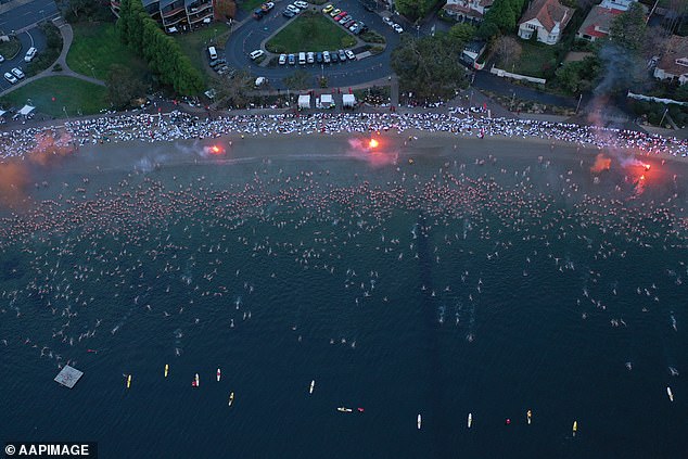 A record number of 3,000 people took a naked sunrise dip in Hobart's River Derwent to mark the winter solstice