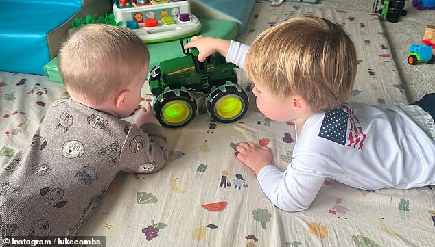 Tex, 2, and Beau, 10 months, play with toy trucks as seen on the country singer's Instagram feed