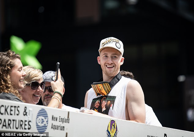 Boston Celtics guard Sam Hauser celebrates winning the 2023-2024 NBA Championship