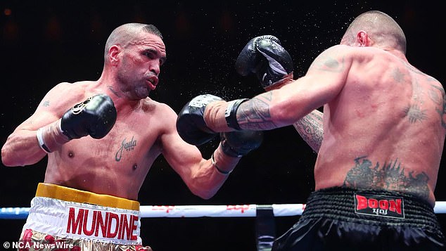 The former boxer, pictured fighting John Wayne-Parr, branded the charges 'oppressive'