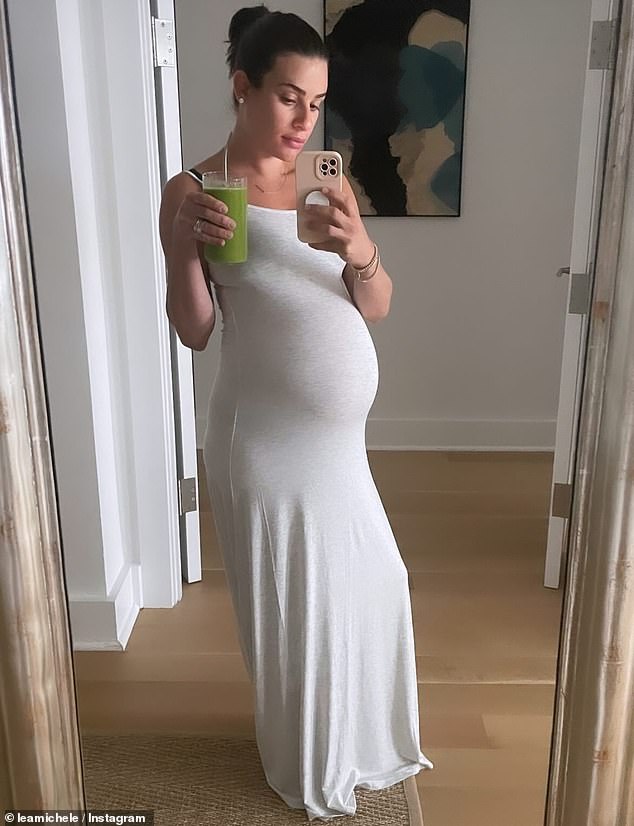Her final appearance was in a floor-length Bumpsuit house dress, which she modeled while striking a spokesmodel pose with a glass of green juice