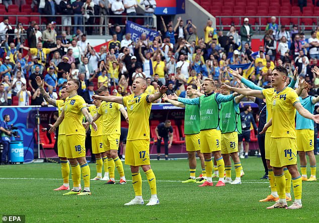 The Ukraine players hugged their fans as they celebrated the historic victory together