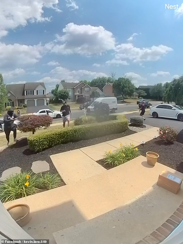 He drops the item at the door and the two porch pirates are seen getting out of their car and running to the door